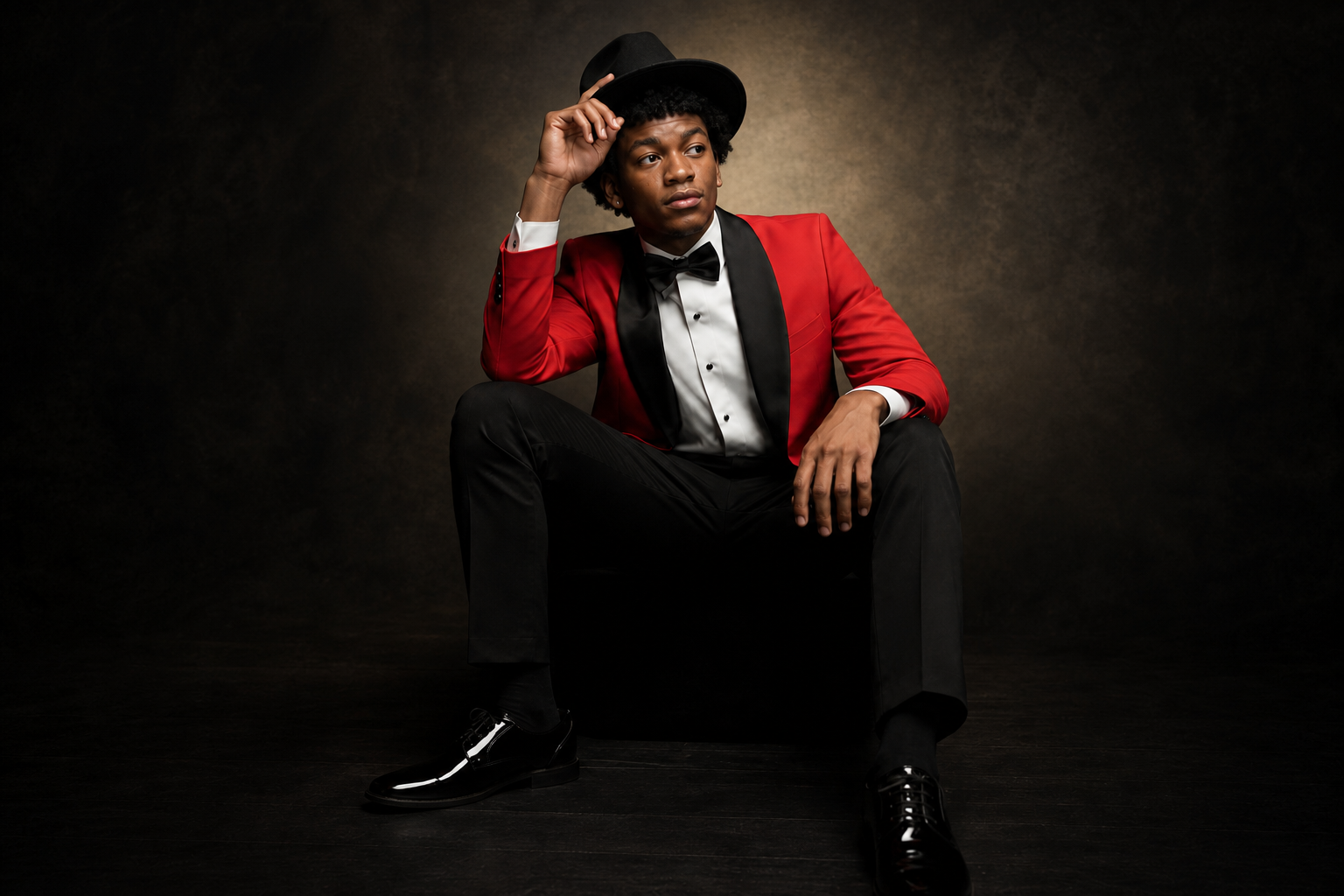 Prom-age model in a Caleb & Co. red tuxedo